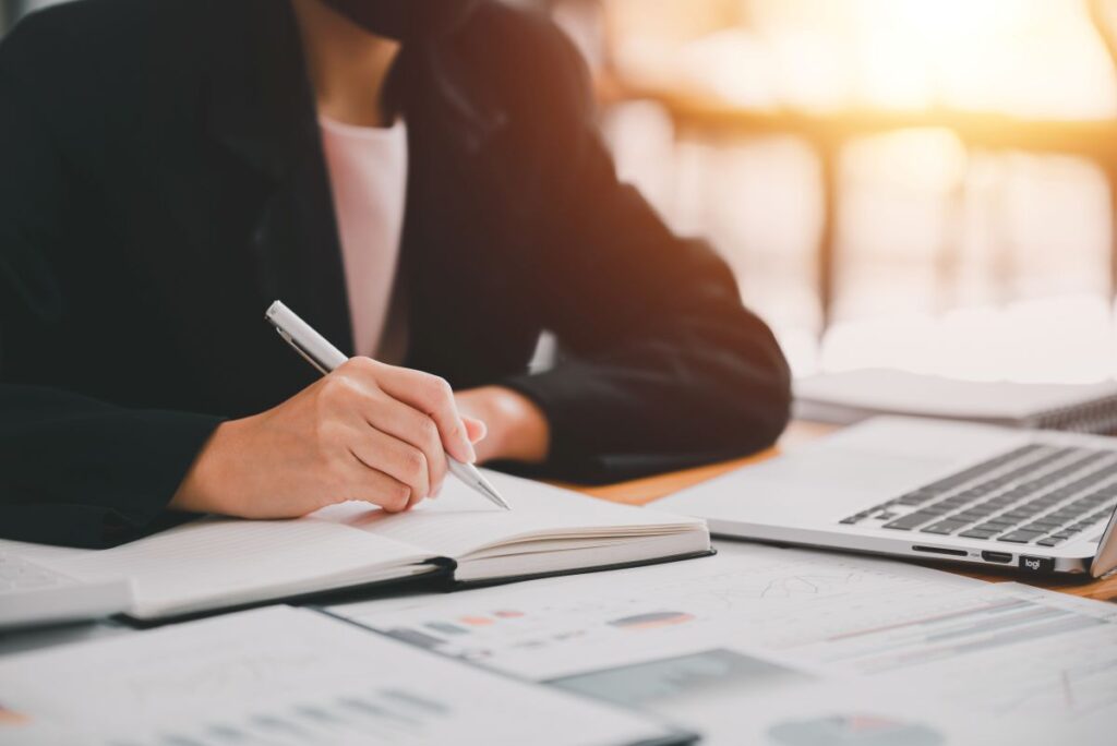Business woman working on a desk for pure protection TCC